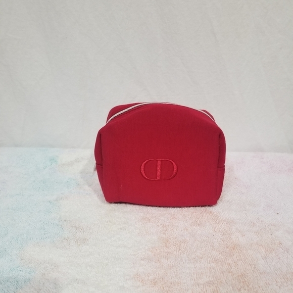 Dior Handbags - Christian Dior cosmetic bag red . New without tags.